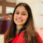 An image of Manu Bhaker smiling