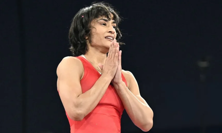 An image of Vinesh Phogat in a red outfit