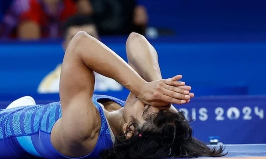 An image of Vinesh Phogat lying down after a fight in Paris Olympics 2024